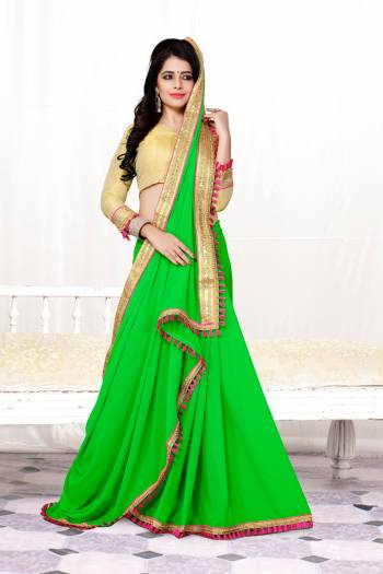 Attract All Wearing This Attractive Green Colored Saree Paired With Golden Colored Blouse. This Saree Is Fabricated On Georgette Paired With Brocade Fabricated Blouse. Both Its Fabrics Are Light In Weight And Ensures Superb Comfort All Day Long. Buy Now.