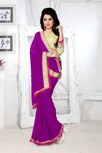 Grab This Pretty Amazing Saree In Purple Color Paired With Golden Colored Blouse. This Saree Is Fabricated On Georgette Paired With Brocade Fabricated Blouse. It Is Beautified With Lace Border. Buy This Saree Now.