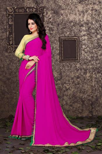 Look Pretty Wearing This Attractive Colored Saree In Rani Pink Color Paired With Golden Colored Blouse. This Saree Is Fabricated On Georgette Paired With Bocade Fabricated Blouse. It Is Light In Weight And Easy To Carry All Day Long.