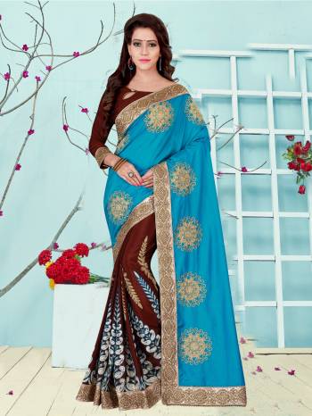 Here Is a Saree With Very Attractive Combination In Blue And Brown Color Paired With Brown Colored Blouse. This Saree Is Fabricated On Satin Silk Paired With Satin Silk Fabricated Blouse. Its Fabrics Ensures Superb Comfort All Day Long. Buy Now.