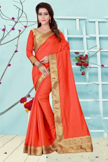 Shine Bright Wearing This Pretty Elegant Saree In Orange Color Paired With Golden And Orange Colored Blouse. This Pretty Saree Is Fabricated On Satin Silk Paired Art Silk Fabricated Blouse. It Is Easy To Drape And Carry All Day Long. Buy Saree Now.