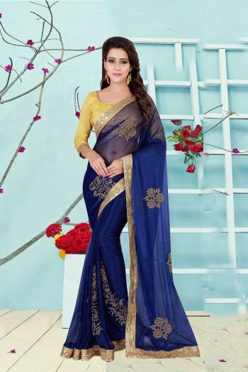 Attract All Wearing This Saree In Blue Color Paired With Contrasting Yellow Colored Blouse. This Saree Is Fabricated On Lycra Paired With Art Silk Fabricated Blouse. This Saree Is Light In Weight And Easy To Carry All Day Long. 