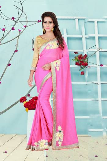 Look The Prettiest Of All Wearing This Saree In Pink Color Paired With Golden Colored Blouse. This Saree Is Fabricated On Georgette Paired With Art Silk Fabricated Blouse. It Is Beautified With Embroidered Patch Work. Buy Now.