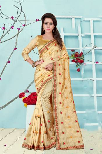 Flaunt Your Rich And Elegant Taste Wearing This Saree In Beige Color Paired With Beige Colored Blouse. This Saree Is Fabricated On Satin Silk Paired With Art Silk Fabricated Blouse. It Has Contrasting Colored Embroidery all Over It. Buy Now.