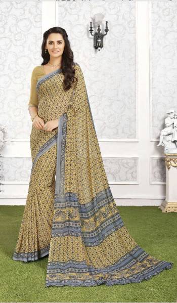 Simple And Elegant Looking Saree Is Here In Beige Color Paired With Beige Colored Blouse. This Saree And Blouse Are Fabricated On Georgette Beautified With Small Prints All Over The Saree. Buy This Saree Now.