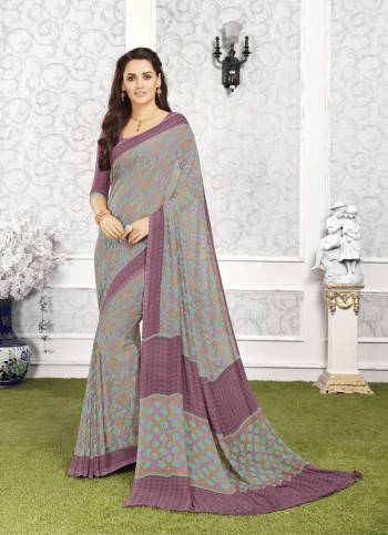 All Color IS The Best Color To Wear, So Grab This Multi Colored Saree Paired With Mauve Colored Blouse. This Saree And Blouse Are Fabricated On Georgette Beautified With Prints All Over It. Buy This Saree Now.