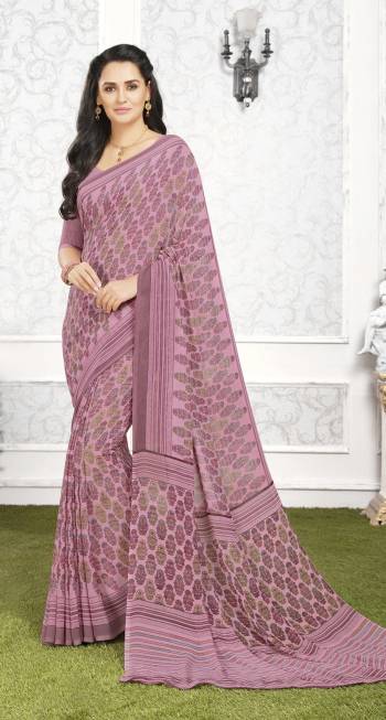 Look Pretty Wearing This Saree Is Dusty Pink Color Paired With Dusty Pink Colored Blouse. This Saree And Blouse Are Fabricated On Georgette Beautified With Simple Prints All Over It. Buy This Saree Now.