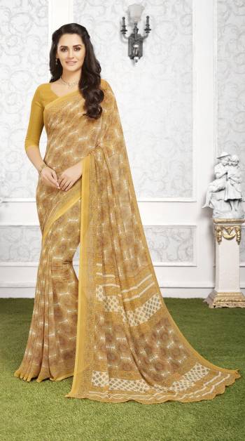 Grab This Pretty Saree In Musturd Yellow Color Paired With Musturd Yellow Colored blouse. This Saree And Blouse Are Fabricated On Georgette Beautified With Prints All Over It. It Is Light In Weight And Easy To Carry All Day Long.