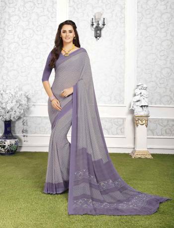 Simplicity Is The Key To Elegance, So Grab Simple Saree In Light Purple Color Paired With Light Purple Colored Blouse. This Saree And Blouse Are Fabricated On Georgette Beautified With Intricate Prints All Over It.