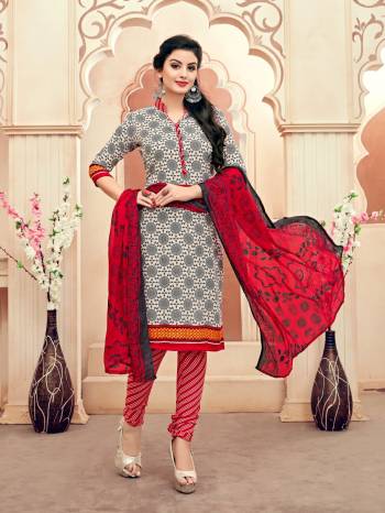 Add Some Casuals With This Pretty Dress Material In White And Grey Color Paired With Red Colored Bottom And Dupatta. Its Top And Bottom Are Fabricated On South Cotton Paired With Chiffon Dupatta. Get This Stitched As Per Your Desired Fit And Comfort.