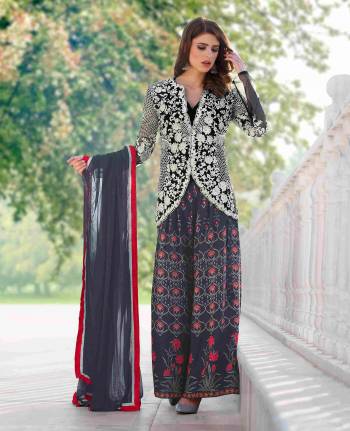 New And Unique Patterned Semi-Stitched Suit In Black, White And Grey Color With Grey Colored Dupatta As Its Bottom Is Attatched Along With It. It Is Fabricated On Maslin And Net Paired With Chiffon Dupatta. It Is Light In Weight And Easy To Carry All Day Long.