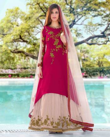 Grab This Beautiful Indo-Western Dress In Dark Pink Colored Top Paired With Pastel Pink Colored Lehenga And Dupatta. Its Top Is Fabricated On Crepe Silk Paired With Net Lehenga And Dupatta. Its Top And Lehenga Are Beautified With Heavy Embroidery All Over It. Buy This Lovely Suit Now.