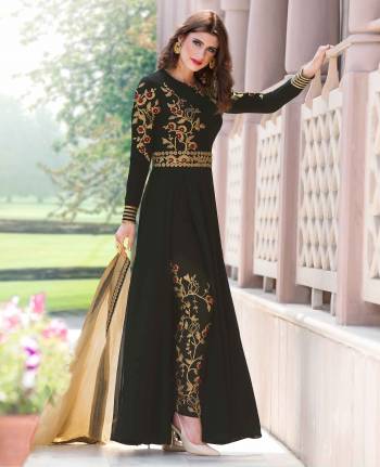 Enhance Youe Beauty Wearing This Designer Indo-Western Suit In Black Color Paired With Black Colored Bottom And Beige Colored Dupatta, Its Top Is Fabricated On Georgette Paired With Art Silk Fabricated Embroidered Pants Paired With Net Fabricated Dupatta. Its Detailed Embroidery Will Earn Your Lots Of Compliments From Onlookers.