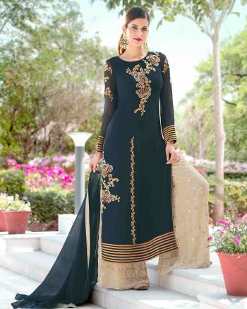 Here Is A Beautiful New Shade Of Blue With This Designer Indo-Western Suit In Teal Blue Colored Top Paired With Beige Colored Bottom And Teal Blue Colored Dupatta. Its Top Is Fabricated On Georgette Paired With Crepe Silk Bottom And Chiffon Dupatta. Its All Three Fabrics Ensures Superb Comfort All Day Long. Buy Now.