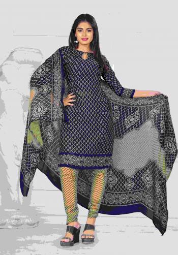 Perfect Suit For Your Casual Wear Is Here In Navy Blue Color Paired With Beige Colored Bottom And Navy Blue And Beige Dupatta. Its Top And Bottom Are Fabricated On Cotton Paired With Chiffon Dupatta. Get This Dress Material Now.