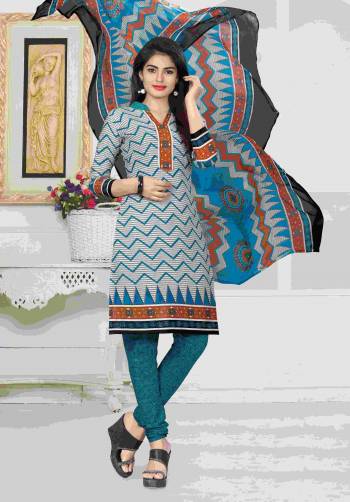 Here Is A Dress Material For Your Casual wear In Grey And Blue Color Paired With Blue Colored Bottom And Dupatta. Its Top And Bottom Are Fabricated On Cotton Paired With Chiffon Dupatta. It Is Light Weight And Easy To Carry All Day Long. Buy Now.