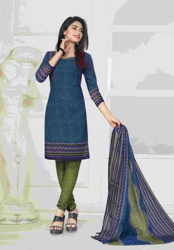 Simple And Elegant Looking Dress Material Is Here In Blue Colored Top Paired With Contrasting Olive Green Colored Bottom And Blue And Green Dupatta. Its Top And Bottom Are Fabricated On Cotton Paired With Chiffon Dupatta. Get This Stitched For Your Casual Wear Which Ensures Superb Comfort All Day Long.