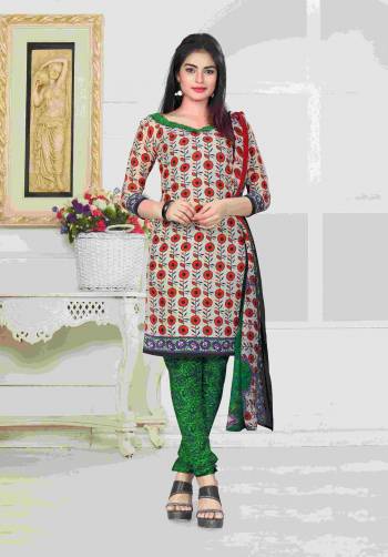 Here Is A Suit For Your Casual Wear In Grey And Red Colored Top Paired With Contrasting Green Colored Bottom And Multi Colored Dupatta. Its Top And Bottom Are Fabricated On Cotton Paired With Chiffon Dupatta. It Is Beautified With Simple Prints All Over It.