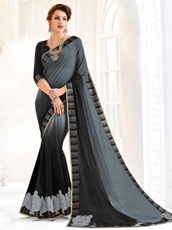 Presenting this grey and black color shaded georgette saree. Ideal for party, festive & social gatherings. this gorgeous saree featuring a beautiful mix of designs. Its attractive color and designer embroidered design, patch design, two color shaded saree, stone, beautiful floral design work over the attire & contrast hemline adds to the look. Comes along with a contrast unstitched blouse.