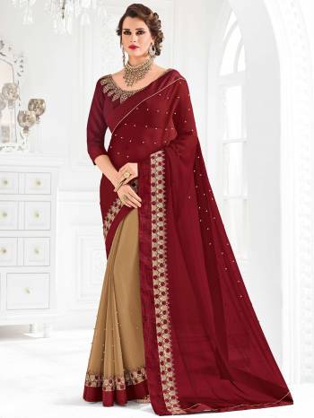 Impress everyone with your amazing Trendy look by draping this maroon and beige color bright georgette and georgette saree. this party wear saree won't fail to impress everyone around you. this gorgeous saree featuring a beautiful mix of designs. Its attractive color and designer embroidered design, patch design, attractive stone design, beautiful floral design work over the attire & contrast hemline adds to the look. Comes along with a contrast unstitched blouse.