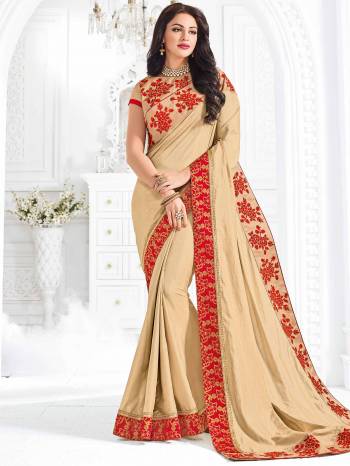 Attractively Gorgeous mesmerizing is what you will look at the next wedding gala wearing this beautiful beige color two-tone silk saree. Ideal for party, festive & social gatherings. this gorgeous saree featuring a beautiful mix of designs. Its attractive color and designer embroidered design, attractive stone design, beautiful floral design work over the attire & contrast hemline adds to the look. Comes along with a contrast unstitched blouse.