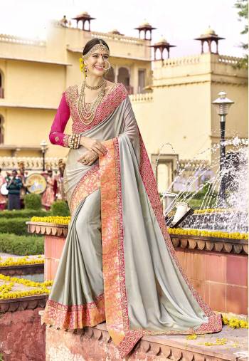 Flaunt Your Ridch And Elegant Taste Wearing This Saree In Grey Color Paired With Contrasting Pink Colored Blouse. This Saree Is Fabricated On  Silk Georgette Paired With Art Silk Fabricated Blouse. It Has Embroidered Blouse And Lace Border. Buy This Saree Now.