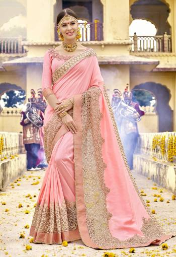 Look Pretty Wearing This Saree In Light Pink Color Paired With Light Pink Colored Blouse. This Saree And Blouse Are Fabricated On Art Silk Beautified With Attractive Embroidery Which Will Earn You Lots Of Compliments From Onlookers.