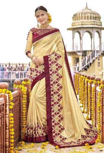 Simple And Elegant Looking Saree Is Here In Beige Color Paired With Maroon and Beige Colored Blouse. This Saree And Bluouse Are Fabricated On Art Silk Beautified With Attractive Detailed Embroidery Which Will Earn You Lots Of Compliments From Onlookers.