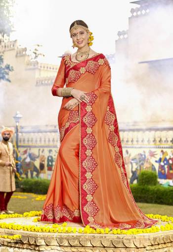 Shine Bright Wearing This Orange Colored Saree Paired With Red And Orange Colored Blouse. This Saree Is Fabricated On Silk Georgette Paired With Art Silk Fabricated Blouse. It Is Beautified With Attractive Lace Border. Buy This Pretty Saree Now.