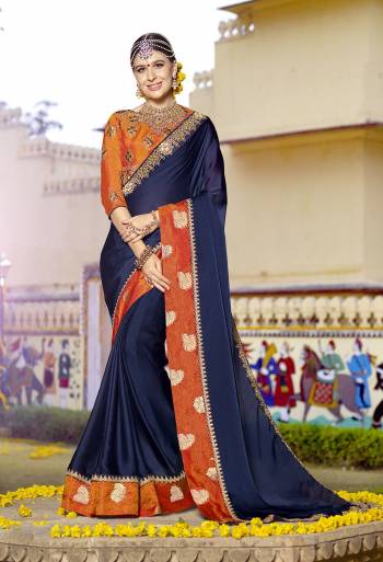 Rich And Elegant Looking Saree Is Here In Navy Blue Color Paired With Contrasting Orange Colored Blouse. This Saree Is Fabricated On Silk Georgette Paired With Art Silk Fabricated Blouse. Its Fabrics Ensures Superb Comfort All Day Long. Buy It Now.