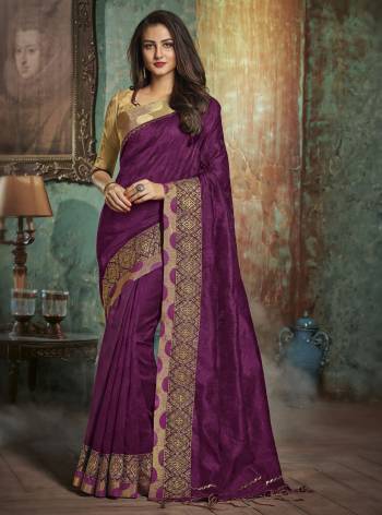 Look Beautiful Wearing This Saree In Purple Color Paired With Beige Colored Blouse. This Saree And Blouse Are Fabricated On Art Silk Beautified With Deatiled Embroidered Lace Border. Buy This Designer Saree Now.