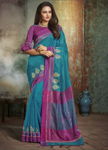 Simple And Pretty Saree Is Here In Turquoise Blue Color Paired With Contrasting Magenta Pink Colored Blouse. This Saree And Blouse Are Fabricated On Art Silk. It Is Light In Weight And Easy To Carry All Day Long.