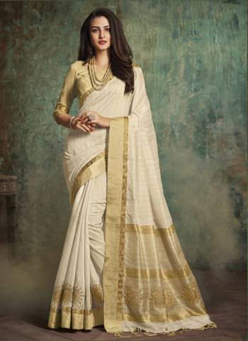 Elegant And Graceful Saree Is In Off-White Color Paired With Beige Colored Blouse. This Saree And Blouse Are Fabricated On Art Silk Beautified With Embroidered Lace Border. Buy This Pretty Saree Now.