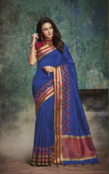 Attract All Wearing This Saree In Blue Color Paired With Contrasting Red Colored Blouse. This Saree And Blouse Are Fabricated On Art Silk Beautified with Embroidery Over The Border. Buy This Saree Now.