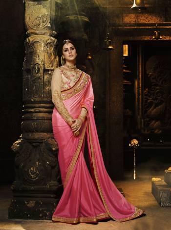 Look Pretty Wearing This Saree In Pink Color Paired With Beige Colored Blouse. This Saree Is Fabricated On Soft Silk Paired With Art Silk Fabricated Blouse. This Saree Is Light In Weight And Easy To Carry All Day Long. Buy This Lovely Saree Now.