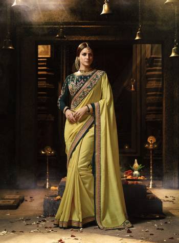 Look Beautiful And Earn Lots Of Compliments Wearing This Designer Saree In Pear Green Color Paired With Contrasting Pine Green Colored Blouse. This Saree Is Fabricated On Soft Silk Paired With Art Silk And Georgette Fabricated Blouse. Buy This Now.