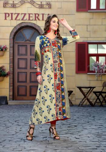 Attractive Prints Are Here In This Pretty Cream Colored Kurti Fabricated On Cotton. It IS Beautified With Multi Colored Prints All Over It. Also It Is Available In Many Sizes. Buy This Kurti Now.