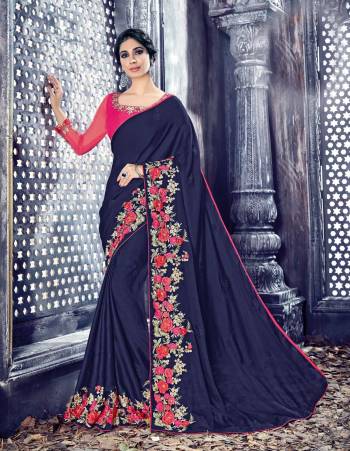 Enhance Your Perosnality Wearing This Saree In Navy Blue Color Paired With Contrasting Dark Pink Colored Blouse. This Saree And Blouse Are Fabricated On Art Silk. Its Lace Border Is Beautified With Multi Colored Embroidery. Buy This Saree Now.