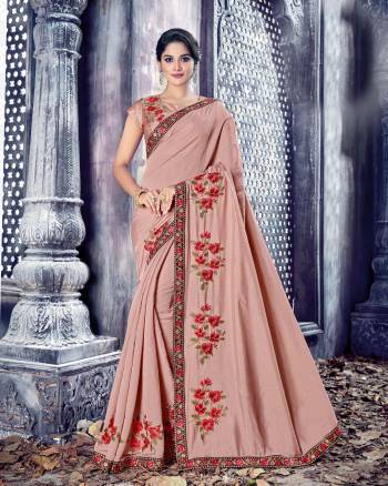 For A Girly And Trendy Look, Grab This Pretty Saree In Dusty Pink Color Paired With Dusty Pink Colored Blouse. This Pretty Saree And Blouse Are Fabricated On Art Silk Beautified With Contrasting Colored Thread Embroidered Patch Work. Buy It Now.