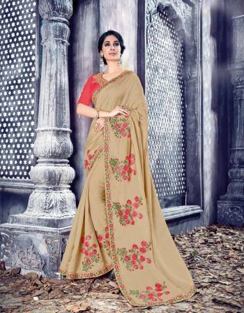 Simple And Elegant Looking Saree Is Here In Beige Color Paired With Dark Peach Colored Blouse. This Pretty Saree And Blouse Are Fabricated On Art Silk Beautified With Colorful Thread Work. It Is Light Weight And Easy To Carry Throughout The Gala. Buy It Now.