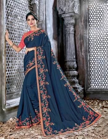 Attract All wearing This Designer Saree In Blue Color Paired With Contrasting Pink Colored Blouse. This Saree And blouse Are Fabricated On Art Silk Beautified With Thread And Jari Embroidery. Buy This Saree Now. 