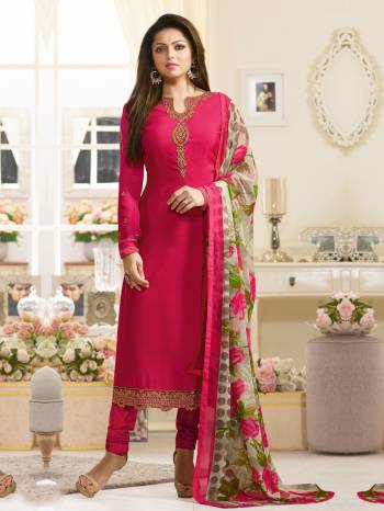 Look Pretty Wearing This Designer Straight Cut Suit In Dark Pink Color Paired With Dark Pink Colored Bottom And Grey And Pink Bold Floral Printed Dupatta. Its Top Is Fabricated On Crepe Paired With Satin Silk Bottom And Chiffon Dupatta. Buy This Suit Now.