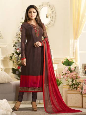 Grab This Lovely Shade In Straight Cut Suit In Brown Color Paired With Brown Colored Bottom And Contrasting Red Colored Dupatta. Its Top Is Fabricated On Crepe Paired With Satin Silk Bottom And Chiffon Dupatta. This Suit Is Light Weight And Comfortable To Carry All Day Long.