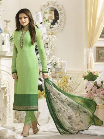 Add This Designer Straight Cut Suit To Your Wardrobe In Light Green Color Paired With Light Green Colored Bottom And Off-White And Green Colored Dupatta. Its Top Is Fabricated On Crepe Paired With Satin Silk Bottom And Chiffon Dupatta. It Is Light Weight And Easy To Carry All Day Long.