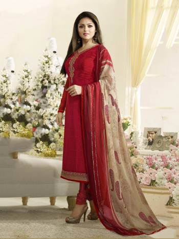 Adorn The Angelic Look Wearing This Red Colored Straight Cut Suit Paired With Red Colored Bottom And Beige Colored Dupatta. Its Top Is Fabricated On Crepe Paired With Satin Silk Bottom And Chiffon Dupatta. Its Top Is Beautified With Embroidery And Has Printed Dupatta. buy Now.