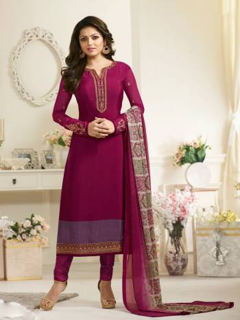 Very Pretty Shade Is Here Which Suits Every Personality. Grab This Staright Cut Designer Suit In Wine Color Paired With Wine Colored Bottom And Grey And Wine Dupatta. Its Top Is Fabricated On Crepe Paired With Satin Silk Bottom And Chiffon Dupatta. Buy This Lovely Suit Now.