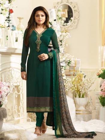 New And Unique Shade Of Green Is Here With This Designer Straight Cut Suit In Pine Green Color Paired With Pine Green Colored Bottom And Grey And Green Dupatta. Its Top Is Fabricated On Crepe Paired With Satin Silk Bottom And Chiffon Dupatta.