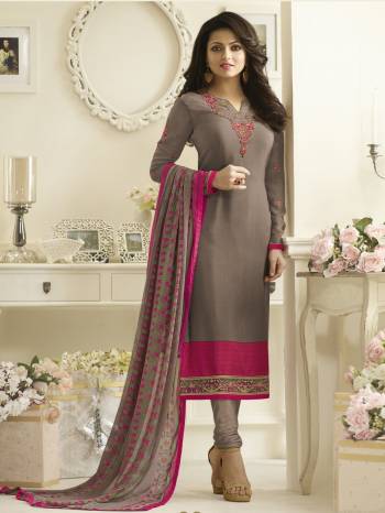 Must Have Color In Every Womens Wardroobe Is Here With This Grey Colored Designer Straight Cut Suit. Its Top Is Fabricated On Crepe Paired With Satin Silk Bottom And Chiffon Dupatta. Its All Three Fabrics Ensures Superb Comfort All Day Long. Buy Now.