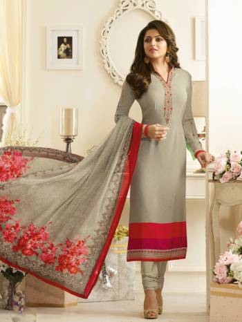 You Will Definitely Earn Lots Of Compliments From Onlookers Wearing This Rich And Elegant Lihgt Grey Colored Straight Cut Suit Paired With Light Grey Colored Bottom And Dupatta. Its Top Is Fabricated On Crepe Paired With Satin Silk Bottom And Chiffon Dupatta. Buy This Designer Suit Now.