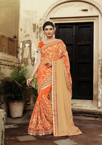 Celebrate This Festive Season Wearing This Designer Saree In Orange And Beige Paired With Orange Colored Blouse. This Saree Is Fabricated On Georgette And Lycra Paired With  Art Silk Fabricated Blouse. This Pretty Saree Will Earn You Lots Of Compliments From Onlookers.